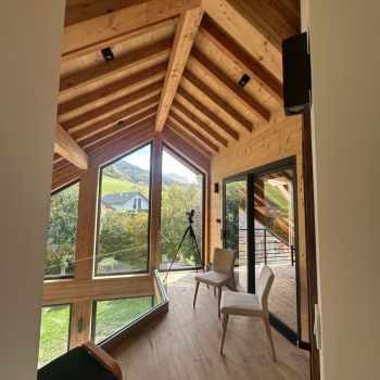 Charpente apparente intérieur maison ossature bois - Villard de Lans